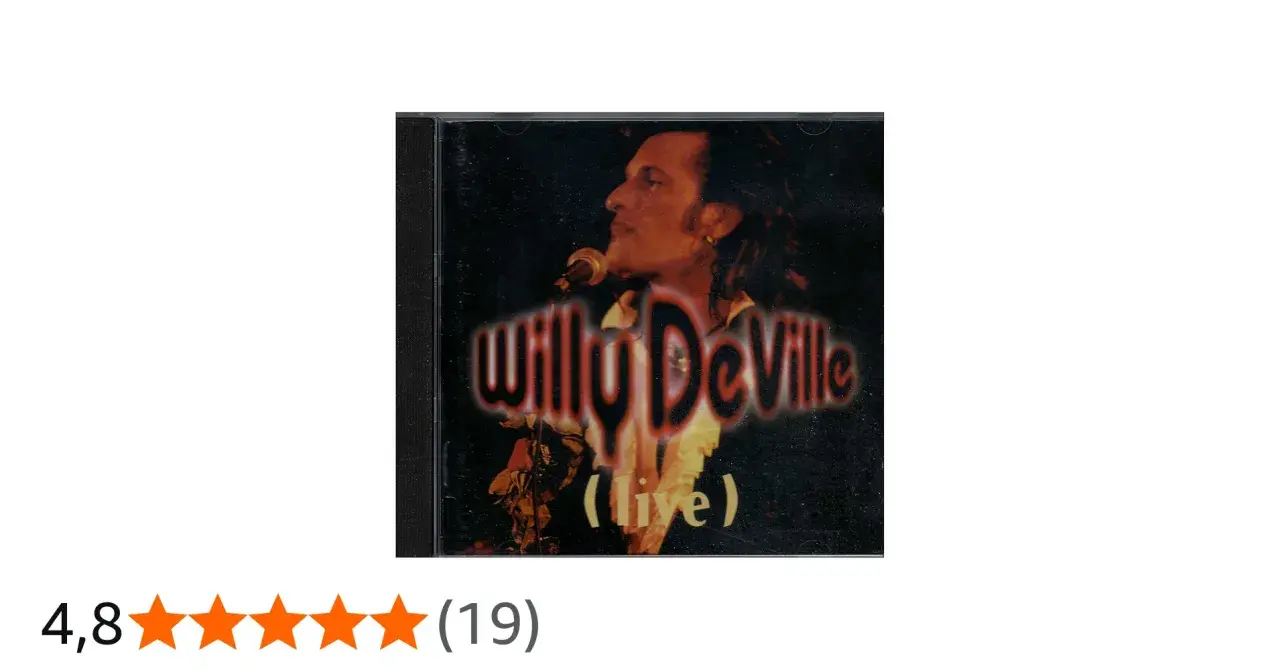 Pochette d'album live de Willy DeVille, avec le chanteur au micro. Un classique pour les amateurs de ses chansons.