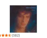 Couverture de l'album "Discovery" de Mike Oldfield, avec un portrait abstrait et des étoiles de notation.