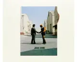 Pochette de l'album Pink Floyd "Wish You Were Here" : deux hommes se serrent la main, l'un d'eux est en feu.