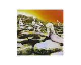 Couverture de Led Zeppelin, Houses of the Holy, avec des enfants nus sur des rochers sous un ciel orangé.