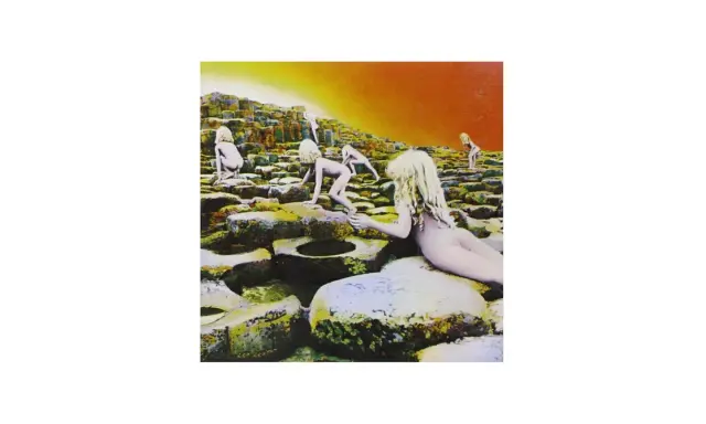 Couverture de Led Zeppelin, Houses of the Holy, avec des enfants nus sur des rochers sous un ciel orangé.